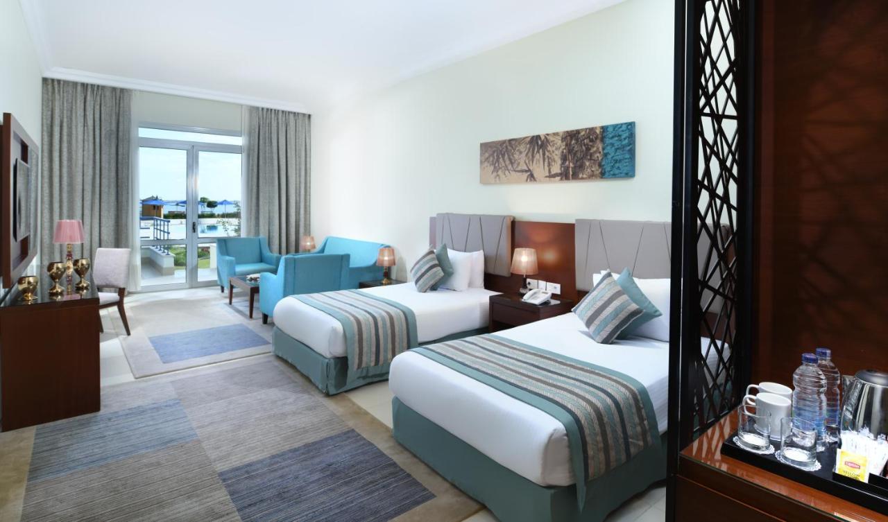 Tolip El Forsan Hotel Ismailia Bagian luar foto A room at the hotel