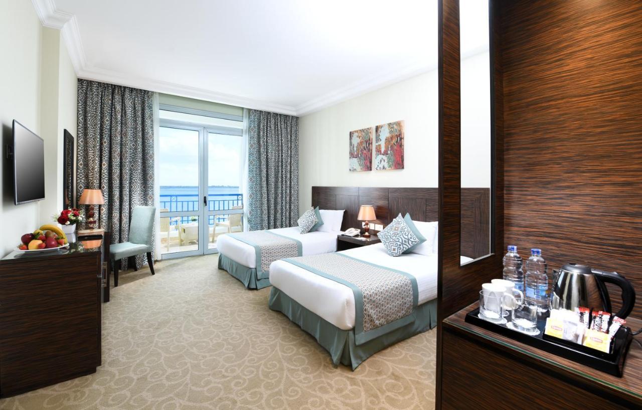 Tolip El Forsan Hotel Ismailia Bagian luar foto A room at the hotel