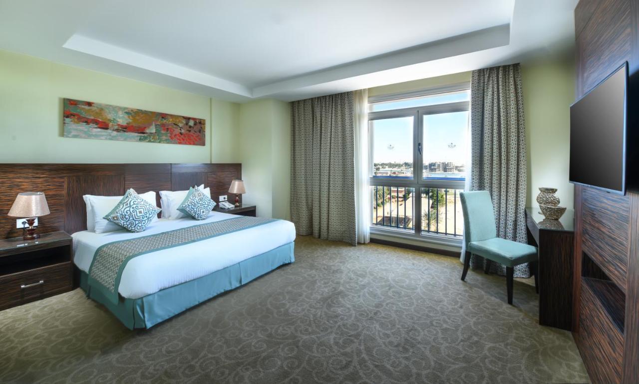 Tolip El Forsan Hotel Ismailia Bagian luar foto Deluxe Room